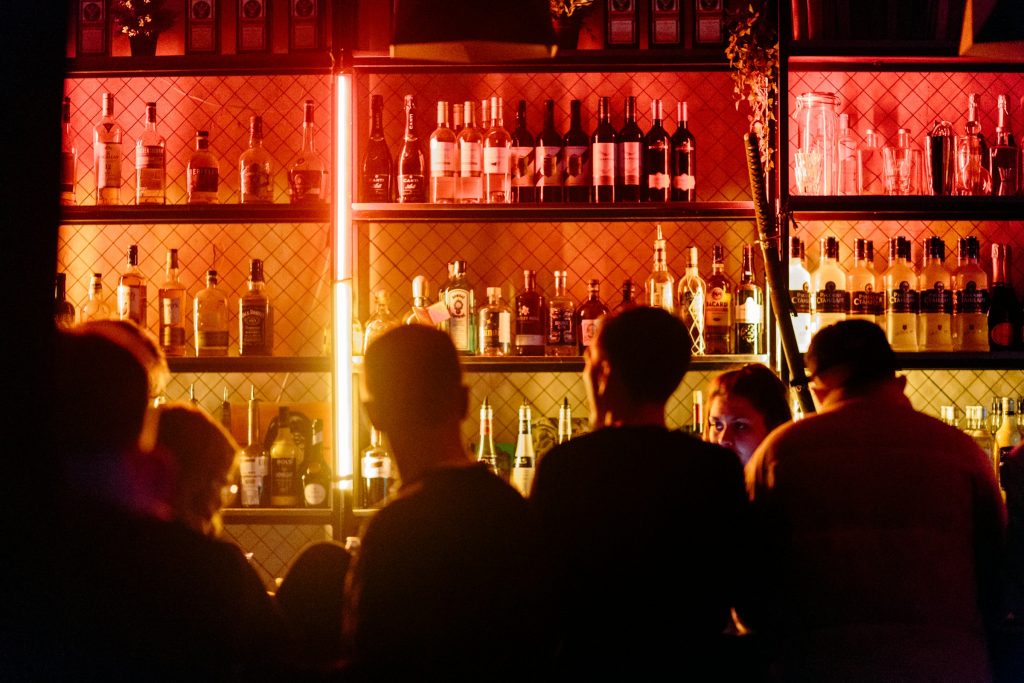 Crowded Berlin bar with drinks counter