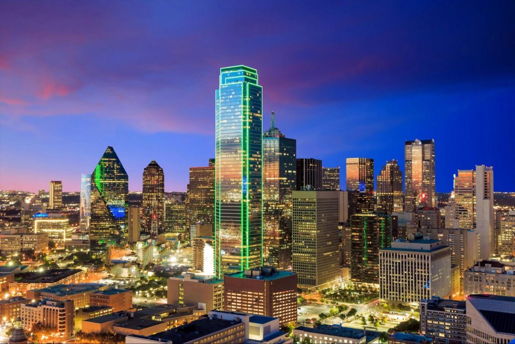Dallas downtown skyline at night with illuminated skyscrapers