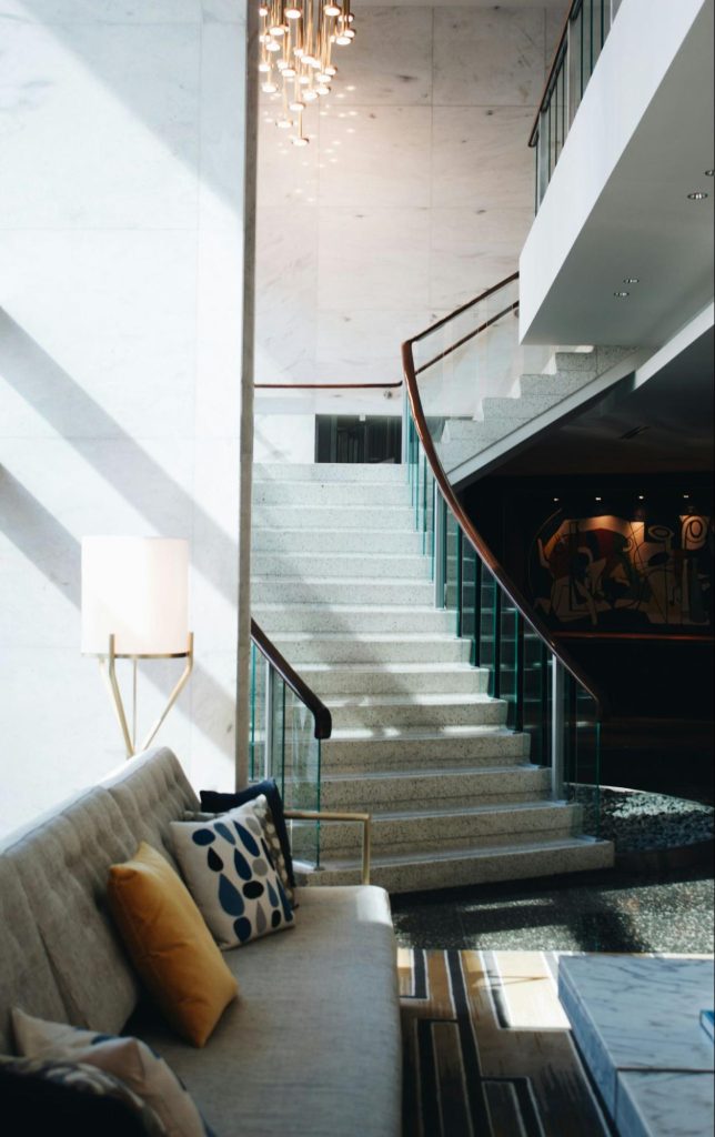 Modern hotel lobby with design-led staircase in Dallas