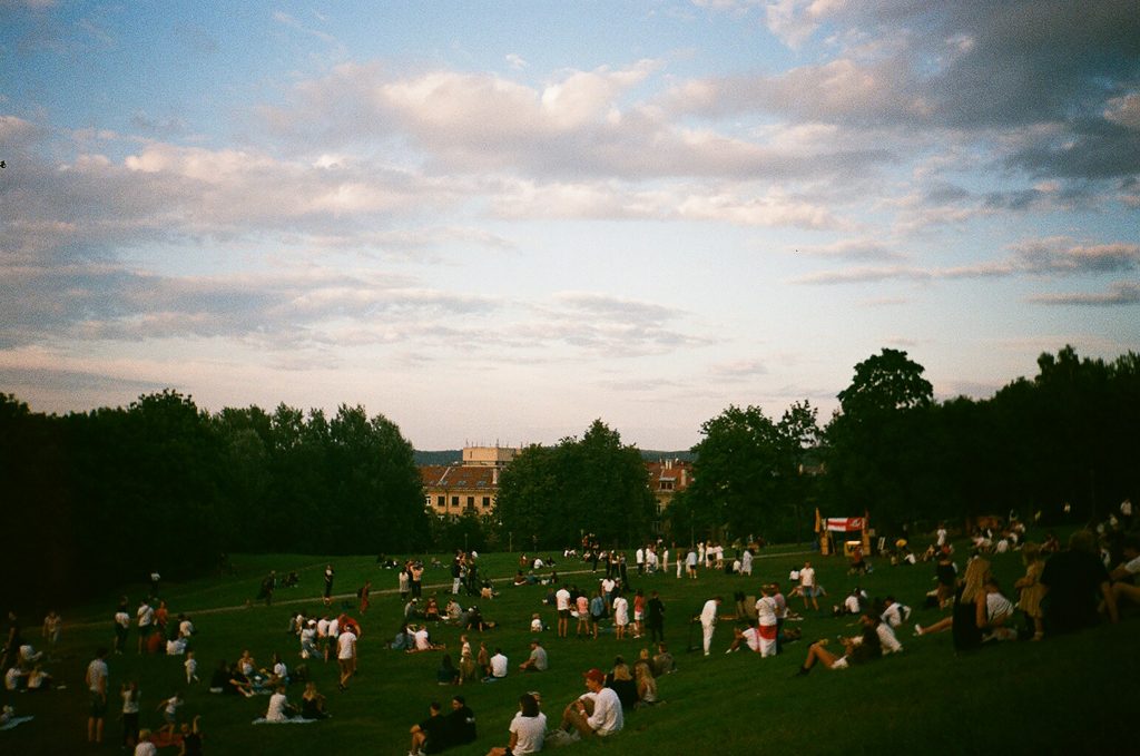 People relaxing in a Vilnius park during summer