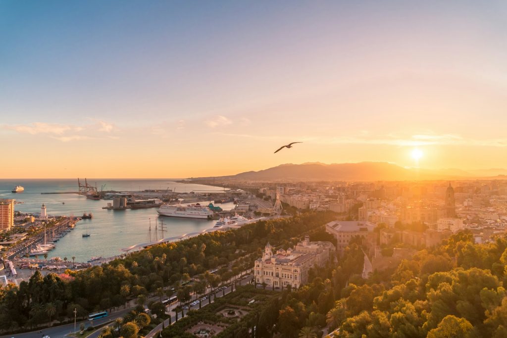 Panoramic view of Málaga port and city at sunset